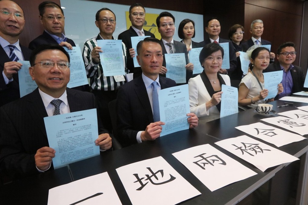 Pro-establishment lawmakers and legal experts form an alliance in favour of the joint checkpoint plan. Photo: Felix Wong