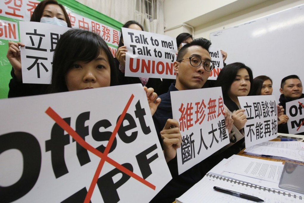 Virgin Airline cabin crew in Hong Kong affected by layoffs protest against the MPF offset mechanism in December 2015. The average administrative fee is still 1.56 per cent a year, not including brokerage and other costs. Photo: Edward Wong