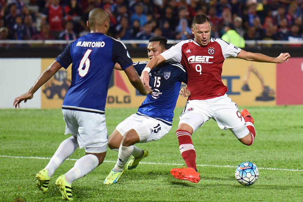 South China’s Nikola Komazec (right) in action. Photo: Nizam Rahman