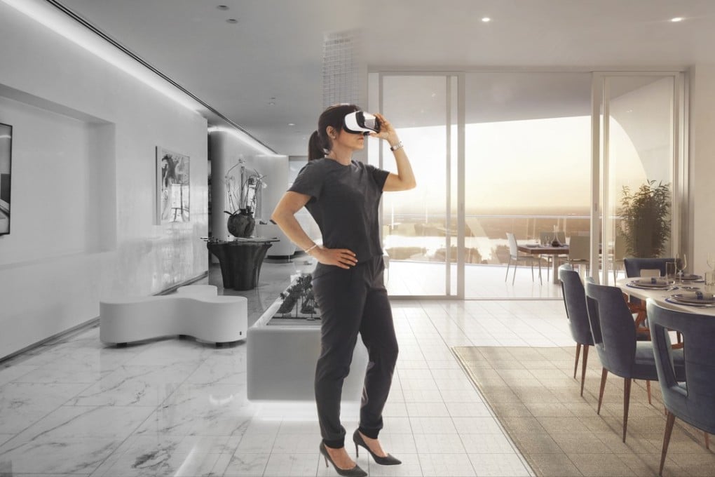 A VR headset is used to view homes in the US before they are constructed. Photo: Handout/Jade Signature