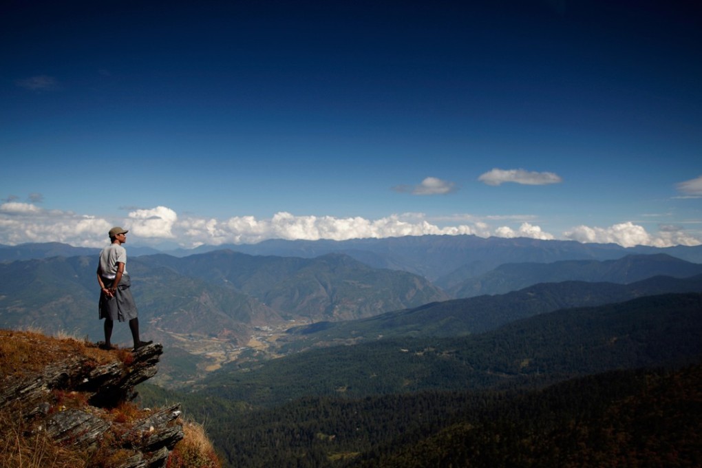 A man looks towards the Paro valley, near the Chele La pass situated between the Bhutanese valleys of Paro and Haa. Many in the Indian media and officials have been propagating a misleading message that Bhutan is a “protectorate” of India. Bhutan has never been a “protectorate”. Photo: AFP