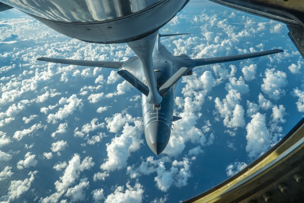 This handout photo taken and released by the US Air Force on July 30 shows a US Air Force B-1B bomber receiving fuel during a 10-hour mission from Andersen Air Force Base, Guam, into Japanese airspace and over the Korean Peninsula. Photo: AFP