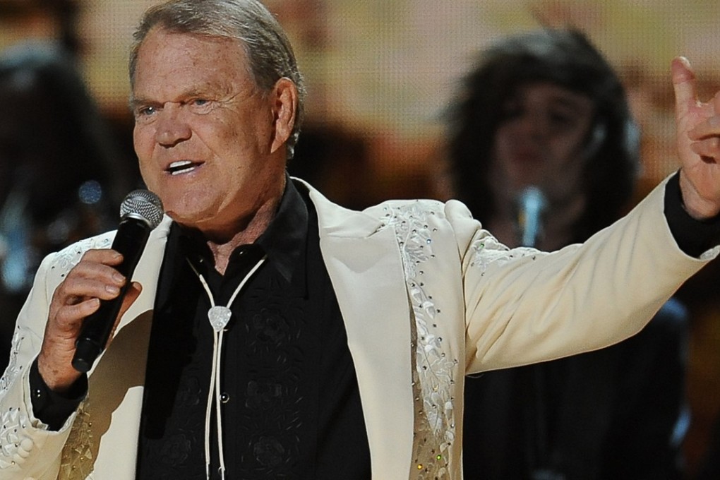 Glen Campbell performing at the Staples Centre during the 54th Grammy Awards. Photo: AFP