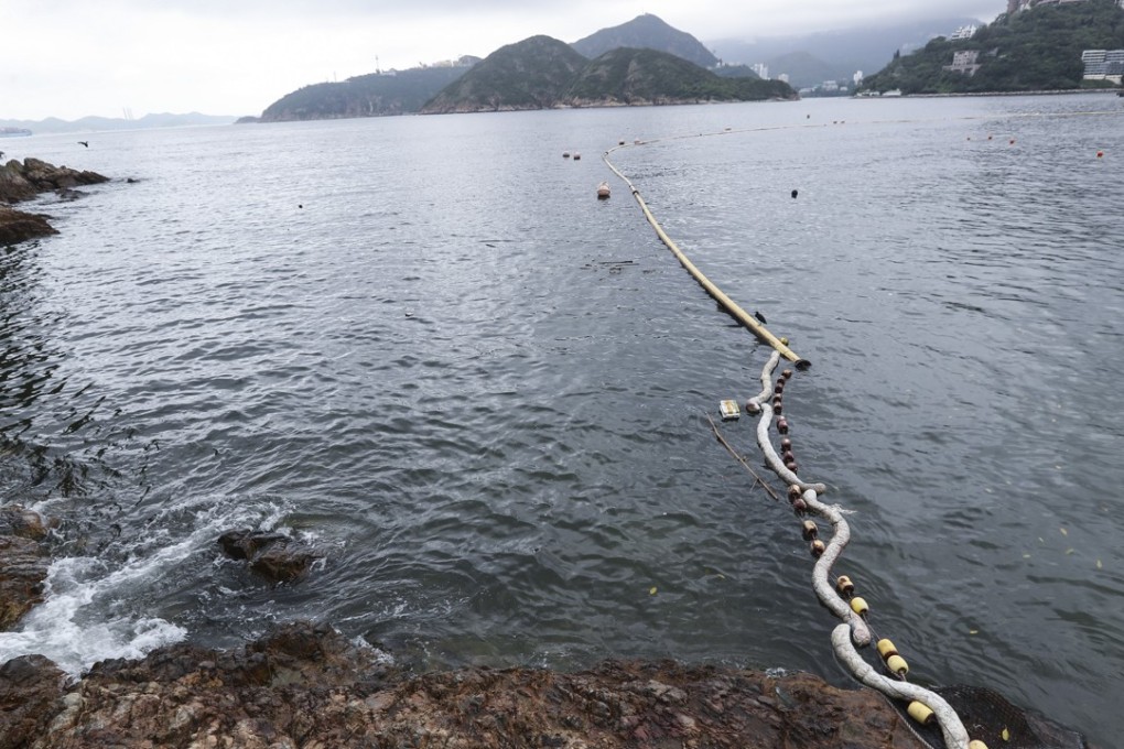 Speaking at Middle Bay Beach on Thursday, Tse said the problem with clumps of palm oil washing ashore had ‘stabilised’. Photo: Nora Tam