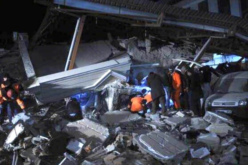 Rescuers search through rubble in the wake of the earthquake in Jiuzhaigou. Photo: Handout