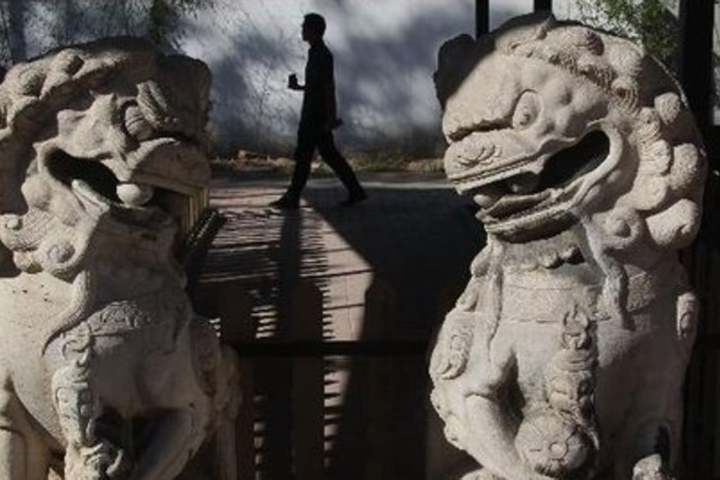 A stone ball has gone missing from the mouth of one of the ancient stone lions at the Old Summer Palace in Beijing. Photo: Handout