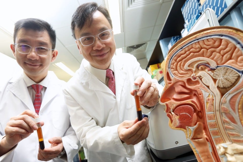 Professor Allen Chan (left) and Professor Dennis Lo talk about the new blood test. Photo: Dickson Lee