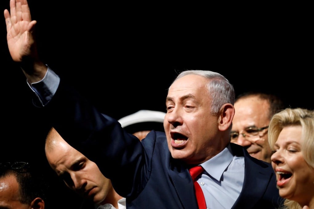 Israeli Prime Minister Benjamin Netanyahu and his wife Sara acknowledge supporters at a rally Tel Aviv on Wednesday. Photo: Reuters