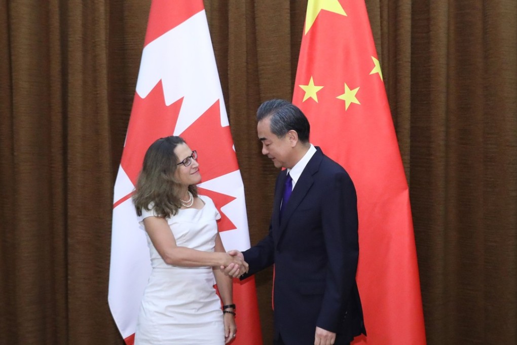 Wang Yi made the call for increased cooperation in a meeting with his Canadian counterpart Chrystia Freeland. Photo: EPA