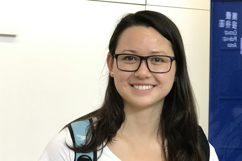 Welcome back: Siobhan Haughey smiles at reporters on her return from the United States after competing at the world championships in Budapest. Photo: Chan Kin-wa