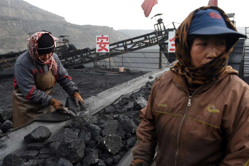 A file picture of workers sorting coal at a mine in Datong in Shanxi province. Photo: AFP