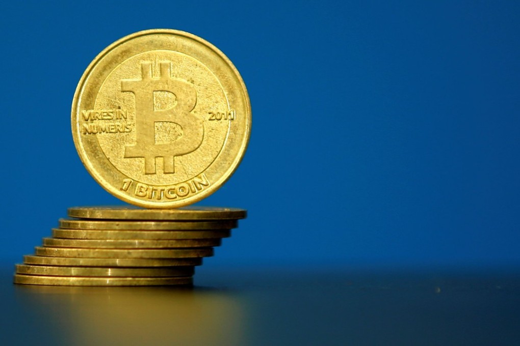 Bitcoin (virtual currency) coins are seen in an illustration picture taken at La Maison du Bitcoin in Paris, France. Photo: Reuters