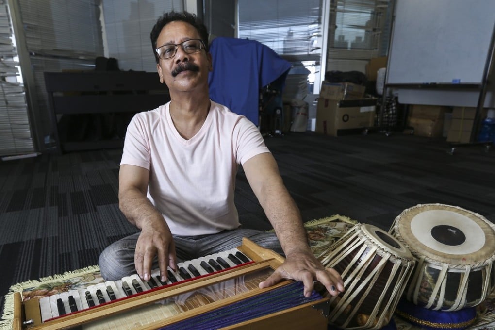 Manik Lal Shah was playing in a restaurant in Tsim Sha Tsui when he was first approached by parents and asked to teach their kids how to play guitar. Photo: Dickson Lee