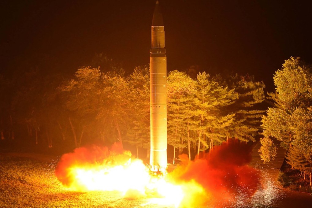 A North Korean intercontinental ballistic missile is pictured lifting off at an undisclosed place in North Korea. Photo: KCNA via AFP