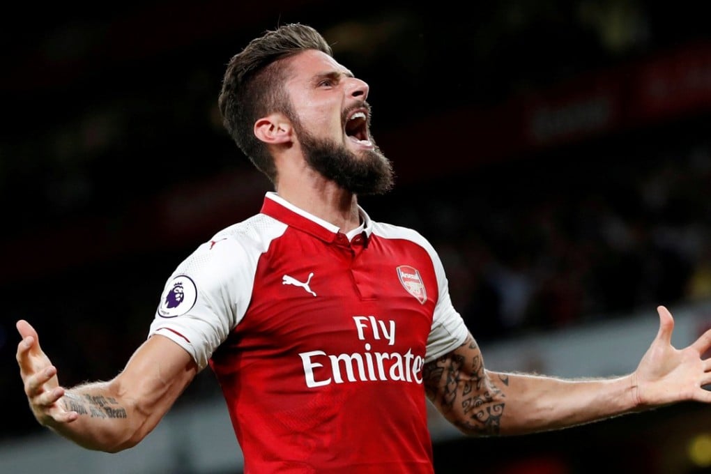 Arsenal's Olivier Giroud celebrates scoring against Leicester City. Photos: Reuters
