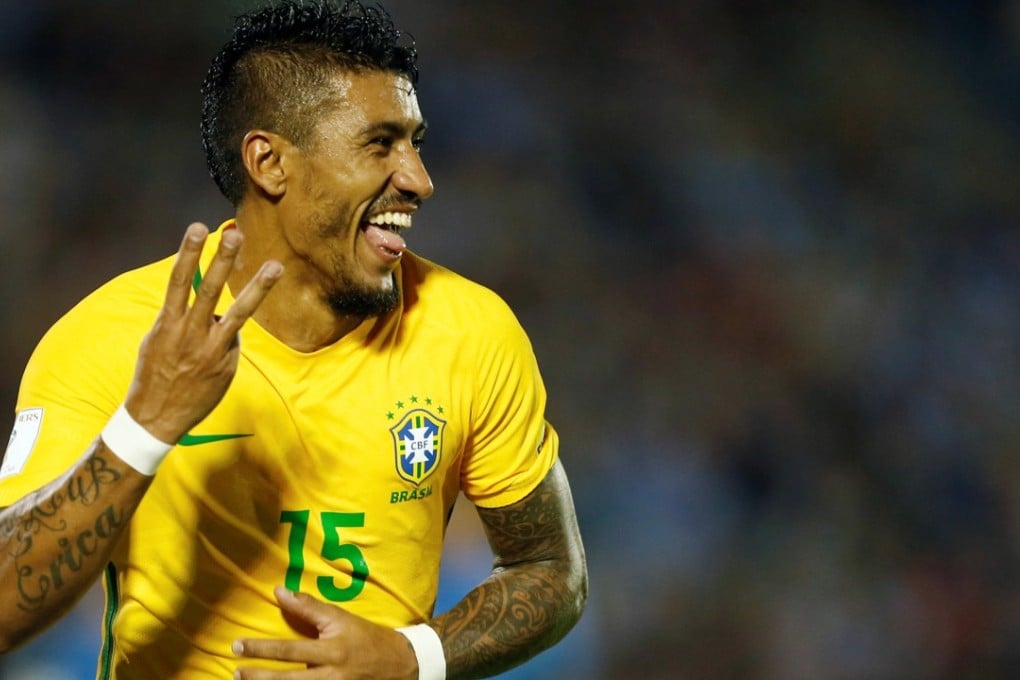 Guangzhou Evergrande's Paulinho set to join Barcelona, says