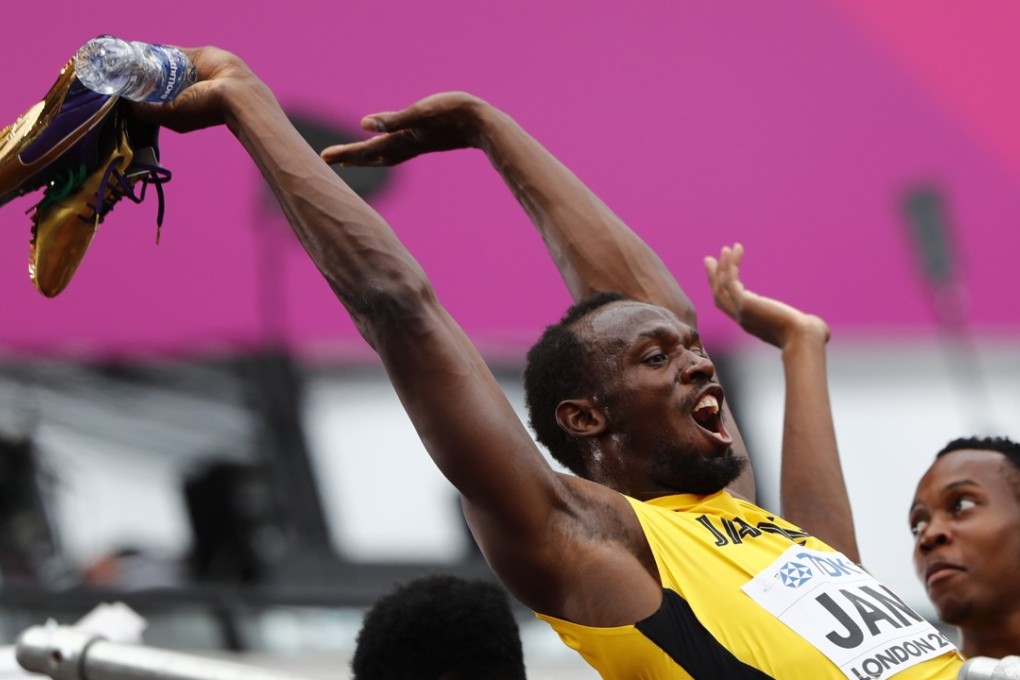 Usain Bolt Jamaica cheers during the women’s competition. Photo: Reuters