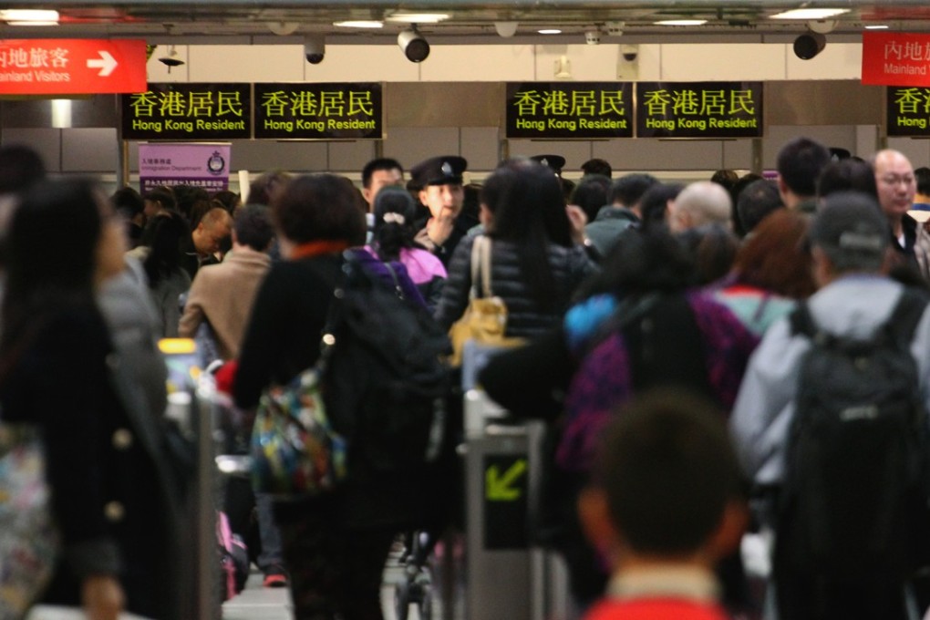 Travellers crossing border to Shenzhen at the Lo Wu border. Photo: SCMP