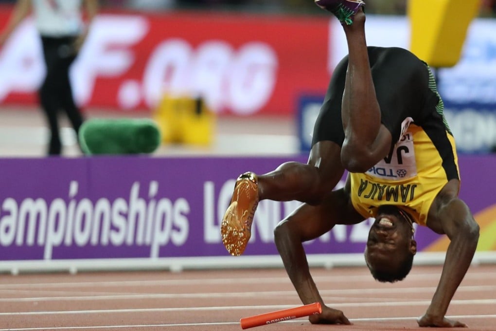 Usain Bolt falls after injuring himself in the final of the 4x100 metres relay at the world championships in London. Photo: AFP