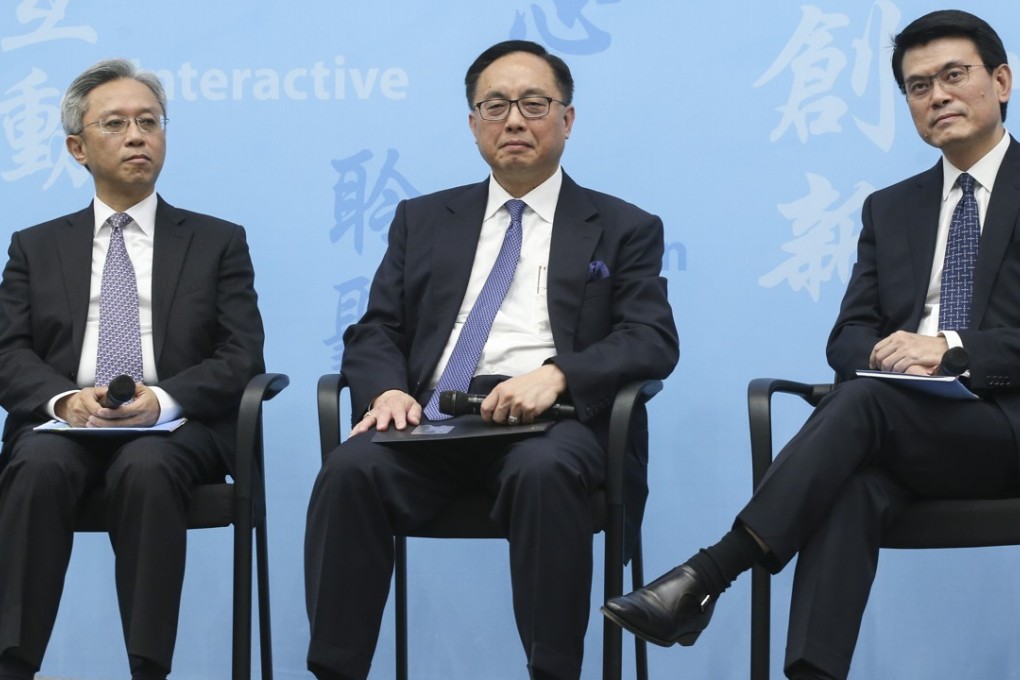 Secretary for Innovation and Technology Nicholas Yang Wei-hsiung (centre) said only transport officials could encourage car pooling and sharing. Photo: David Wong