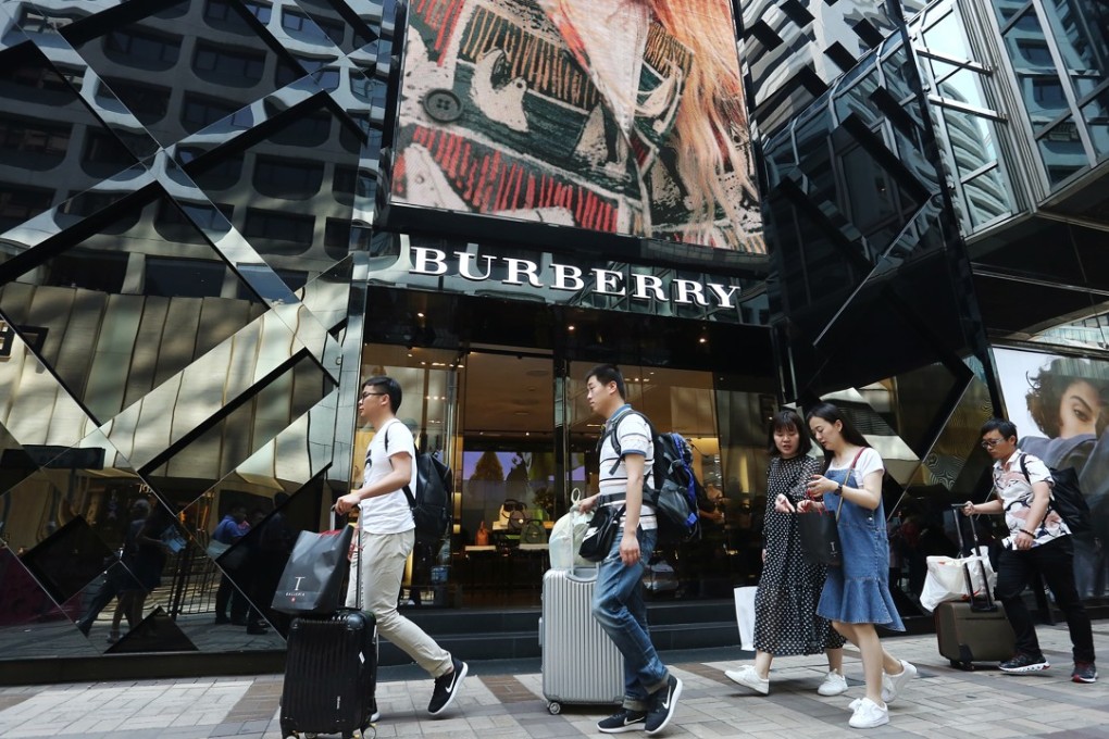 Beijing’s tighter customs controls have made it more difficult for daigou – personal shoppers to buy goods abroad to bring back to China to avoid the hefty taxes, and led to more luxury purchases online and at home. Photo: Jonathan Wong