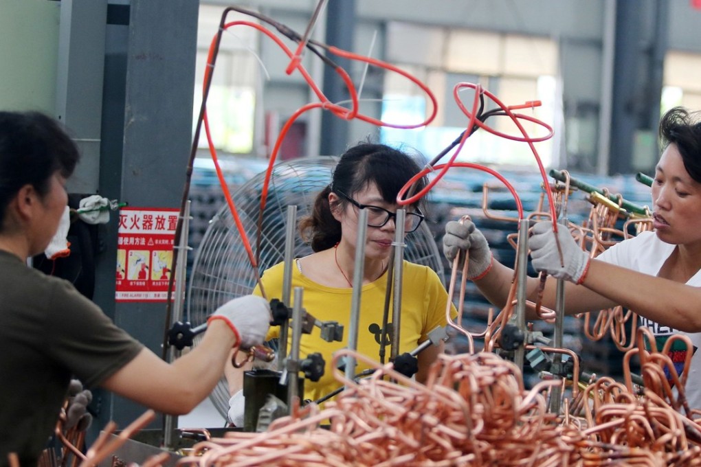 Factory output rose by 6.4 per cent in July – the slowest rate this year. Photo: AFP