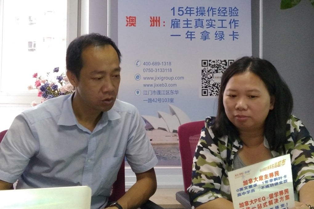 Liu Zhenbiao (left) runs a company in Jiangmen that provides emigration advice and assistance to people like Mey Hou (right) who returned to China in December 2015 after 15 years in Venezuela. Photo: SCMP Pictures