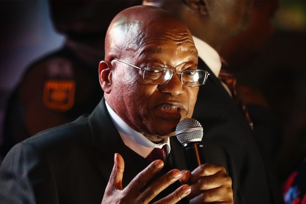 South African president Jacob Zuma after winning a vote of no confidence speaks to a crowd of his supporters outside parliament in Cape Town, South Africa. Photo: EPA