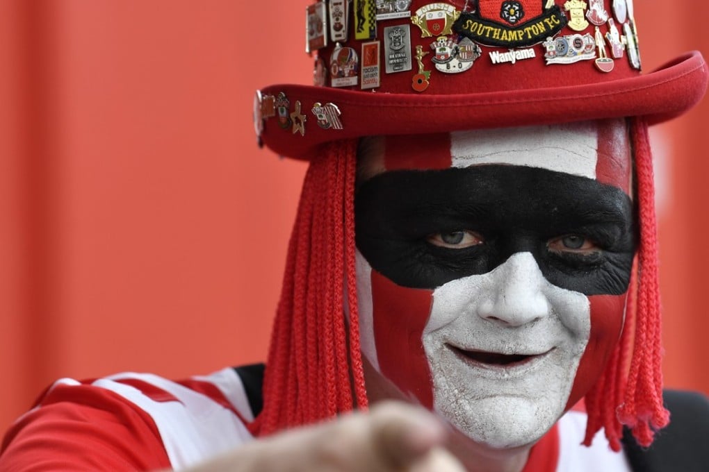 A Southampton fan in the club’s colours during its match against Manchester City at St Mary's Stadium on April 15 . Photo: Reuters