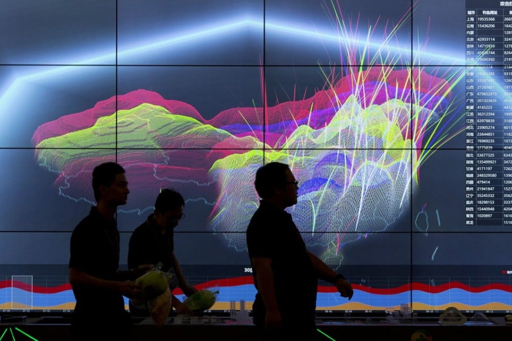 Attendees walk past a live visualisation of internet attacks across China during the 4th China Internet Security Conference (ISC) in Beijing last year. Photo: AP