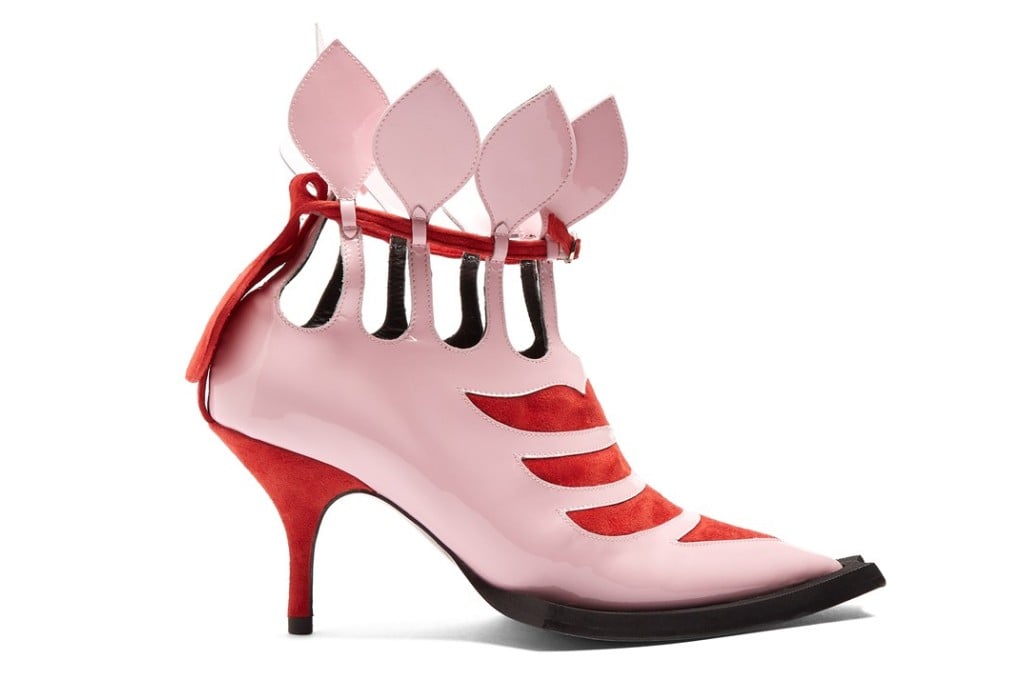 Make heads turn in the pink and red Lydia ankle boots and the oversized Chanel sunglasses