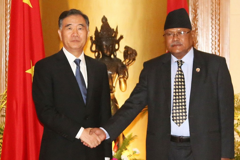 Chinese Vice-Premier Wang Yang, left, shakes hands with Nepali Deputy Prime Minister Bijay Kumar Gachhadar in Kathmandu on Tuesday. Photo: Xinhua