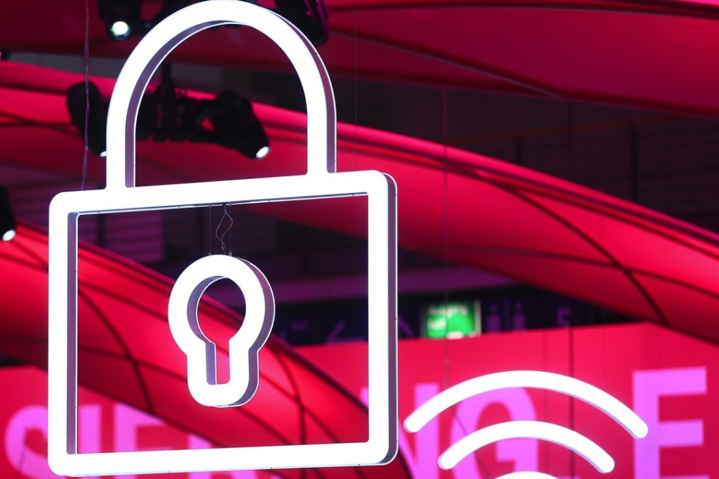 Illuminated icons representing cyber security, left, and wireless 'wifi' connectivity. Photo: Bloomberg