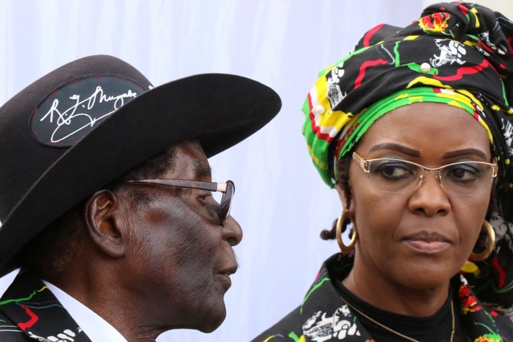 President Robert Mugabe and his wife Grace attend a rally of his ruling ZANU (PF) in Chinhoyi, Zimbabwe, on July 29. Photo: Reuters