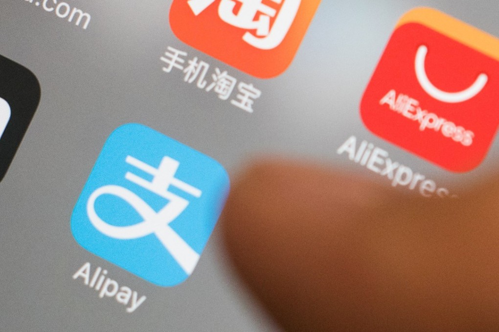 The Alipay icon is seen on an Apple iPad. Alipay has entered into a partnership with Yelp. Photo: Bloomberg