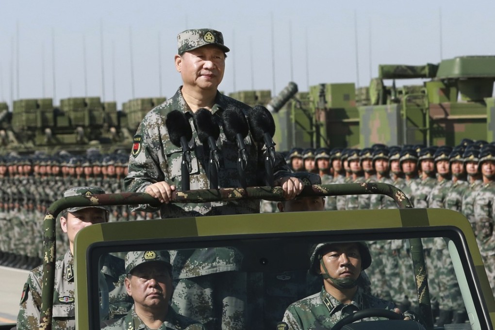 President Xi Jinping inspects troops during a military parade to commemorate the 90th anniversary of the founding of the PLA, at a training base in Inner Mongolia on July 30. Photo: Xinhua