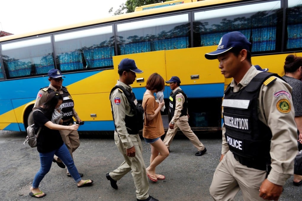 A file picture of Chinese citizens arrested last month in Cambodia for suspected telecoms fraud. Photo: Reuters