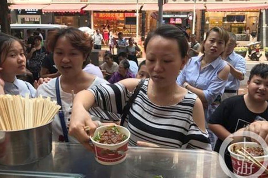 Long queues formed after city residents learnt of the free noodles on offer. Photo: Handout