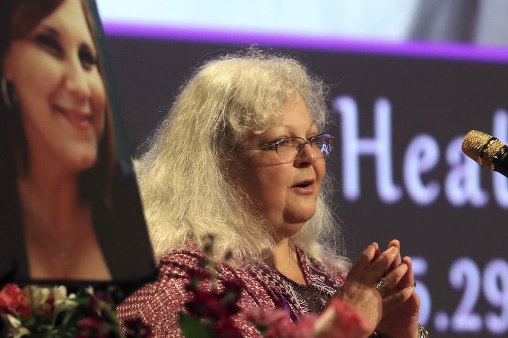 Susan Bro, mother to Heather Heyer, speaks during a memorial for her daughter on Wednesday at the Paramount Theatre in Charlottesville, Virginia. Photo: AP