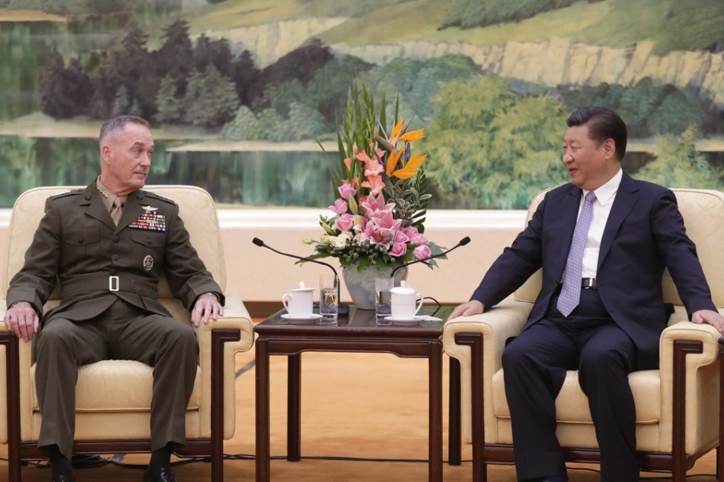 US Chairman of the Joint Chiefs of Staff Joseph Dunford (left) talks to President Xi Jinping during a meeting at the Great Hall of the People in Beijing on Thursday. Photo: AP