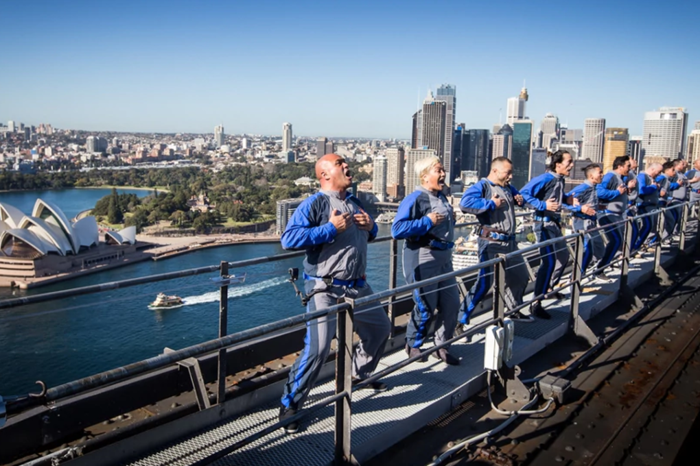 Haka For Life perform the Ngati Toa Rangatira haka, Ka Mate, at the top of Sydney Harbour Bridge as a symbol of bringing people and cultures together. Photo: Supplied