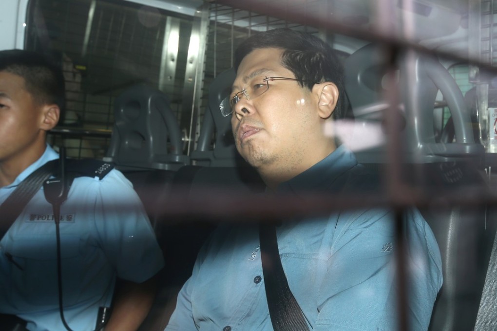 Howard Lam Tsz-kin being escorted to Kowloon City Court by police officers. Photo: K.Y. Cheng