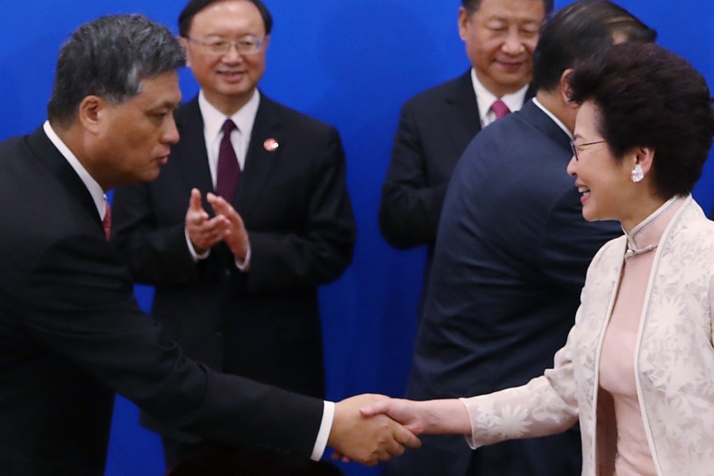 Ma Xingrui, left, governor of Guangdong province, shakes hands with Carrie Lam Cheng Yuet-ngo, chief executive of Hong Kong at a signing ceremony for the Framework Agreement on Deepening Guangdong-Hong Kong-Macau Cooperation. Photo: Nora Tam