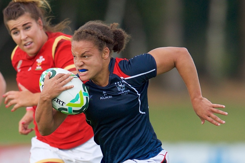 Natasha Olson-Thorne charges away to score for Hong Kong against Wales. Photo: HKRU