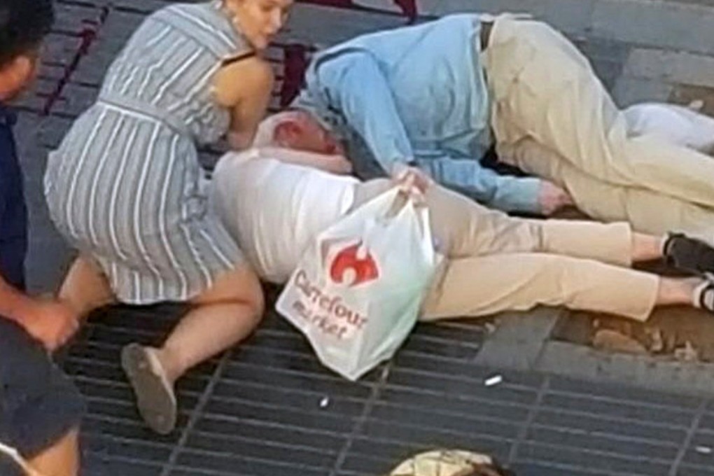 Victims are strewn on the ground near Las Ramblas in Barcelona, after a suspected terrorist attack by a man who ploughed a van through crowds of tourists. Photo: Reuters