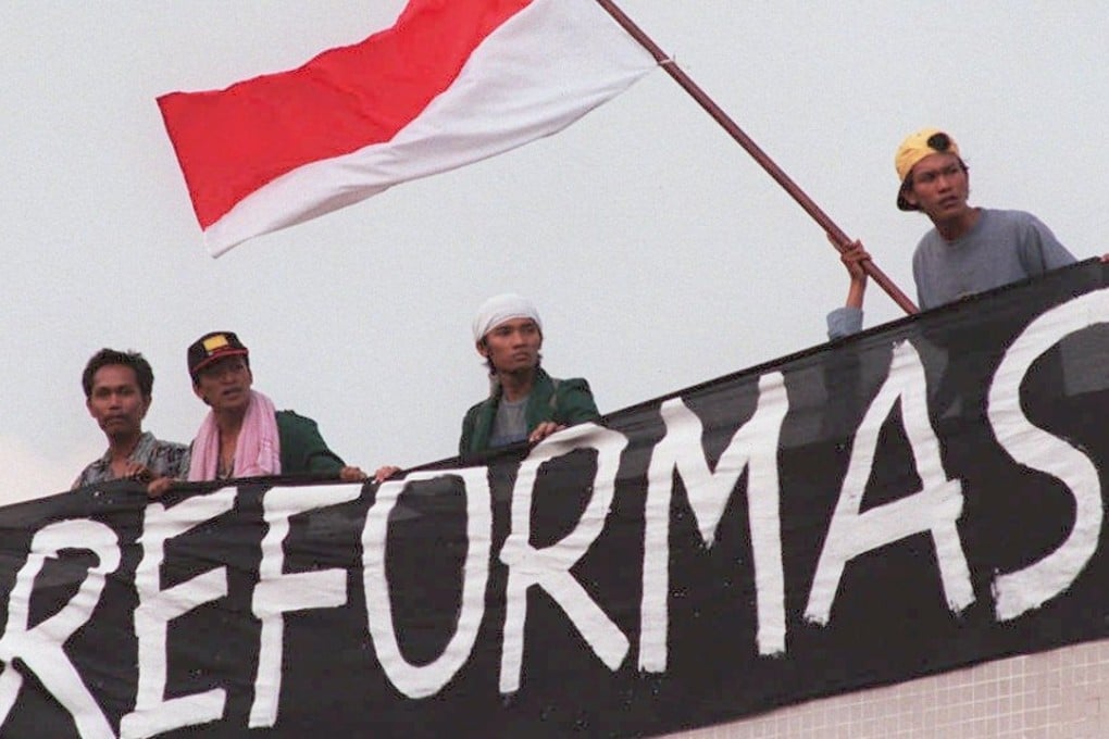 Indonesian students call for Suharto to go. Photo: AFP