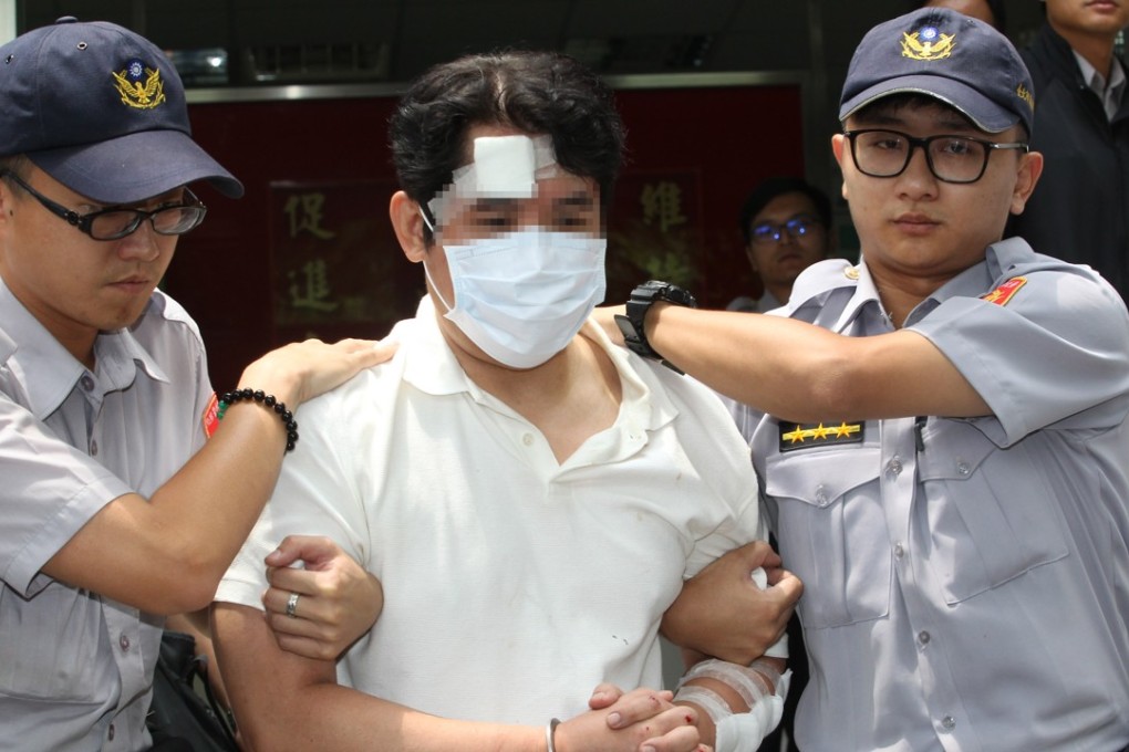 A 51-year-old man is arrested outside the Presidential Office Building in Taipei, Taiwan, on Friday. Photo: CNA