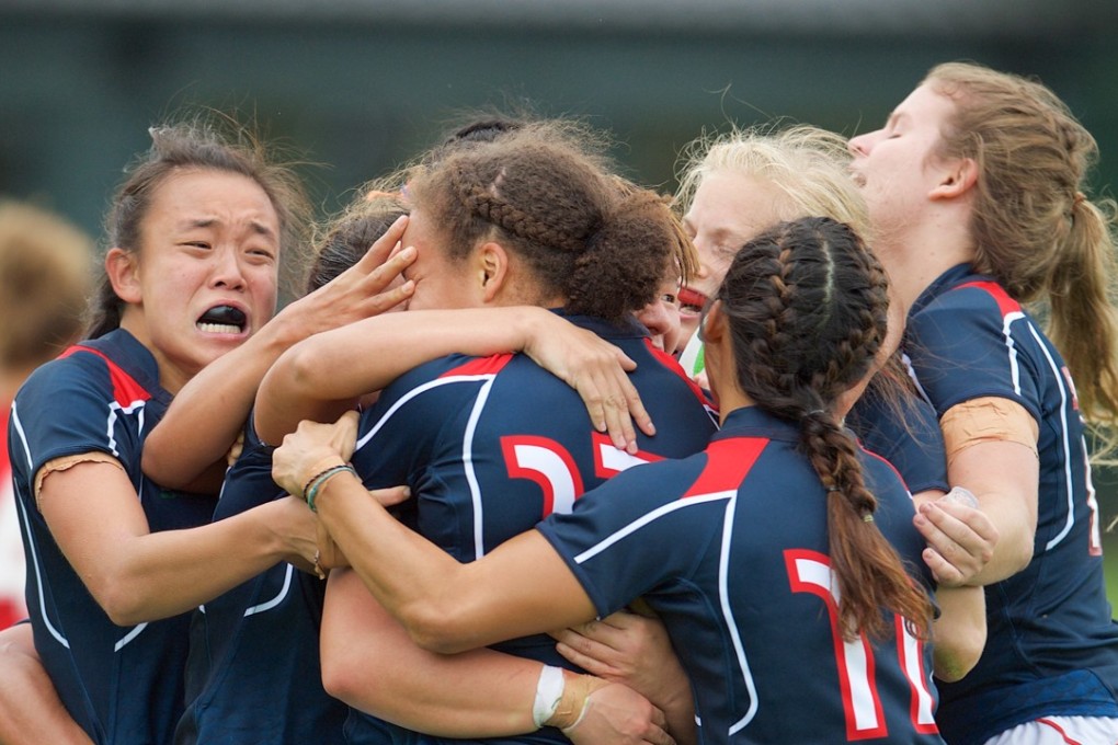 A jubilant Hong Kong celebrate scoring a try in their 39-15 loss to Wales. Photos: HKRU