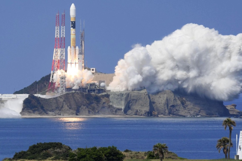 An H-IIA rocket carrying a navigation satellite Michibiki lifts off from Tanegashima Space Centre in southern Japan. Photo: Kyodo/AP