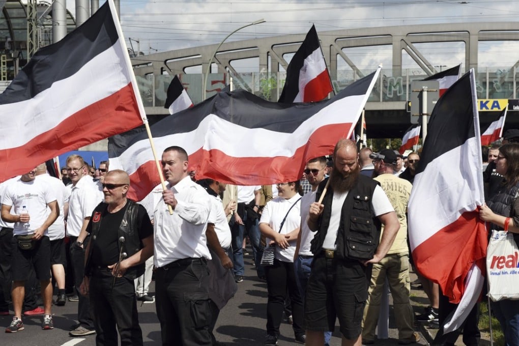 Far-right groups gather to commemorate the death of Adolf Hitler's deputy, Rudolf Hess, in Berlin's western district of Spandau. Photo: AP